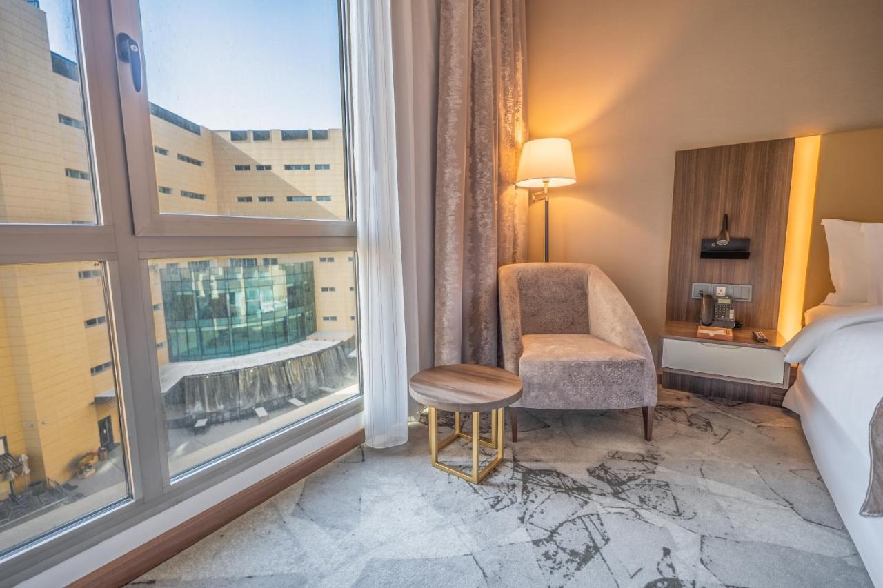 Grand Millennium Al Seef Basra Экстерьер фото